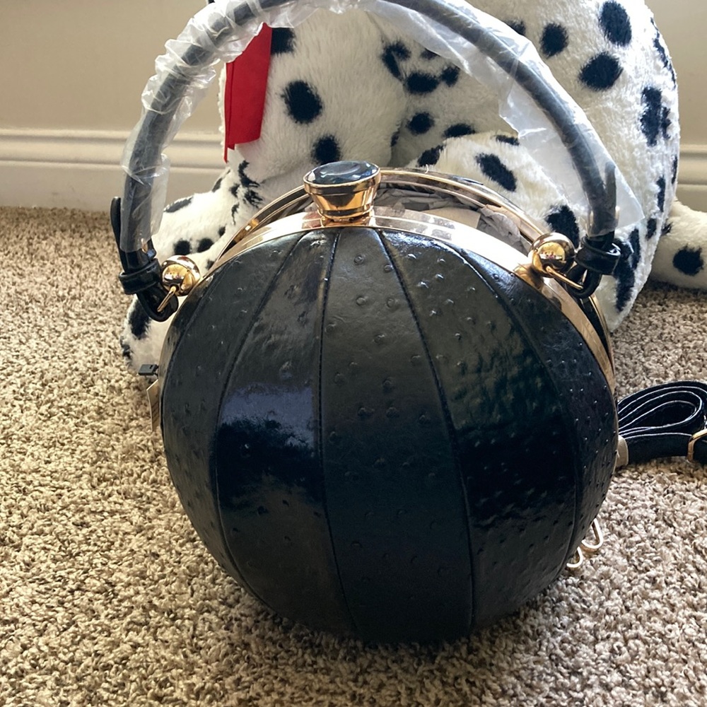Never worn,black basketball shaped bag,detachable strap,faux Ostrich leather.